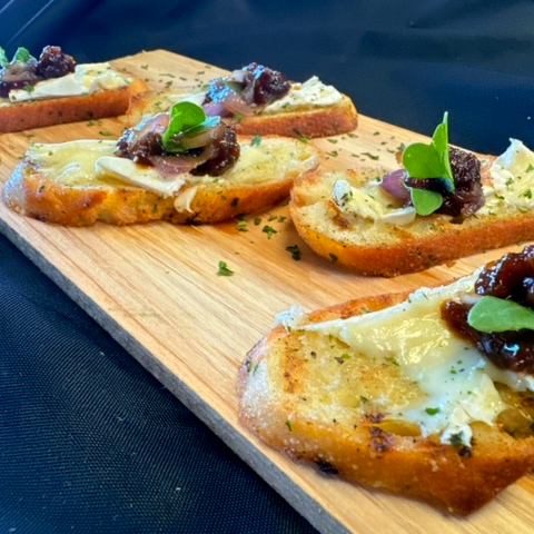 Crostini with Brie, Fig Jam & Caramelized Onions